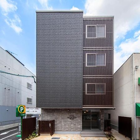 Grand Base Okayama Ekimae Aparthotel Exterior foto